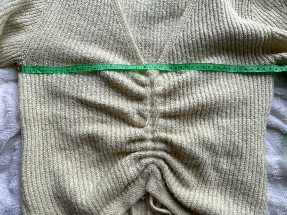 Sweter z bufiastymi rękawami ściągaczem Mango