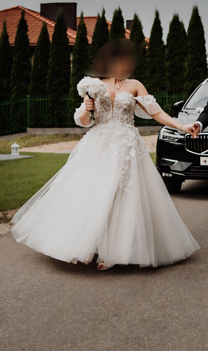 Suknia ślubna gorsetowa z koronką