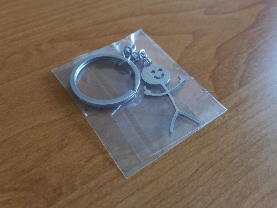 [NOWY] Brelok do kluczy - Ludzik pokazujący środkowy palec [Srebrny]