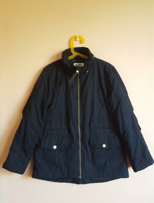 Темно синя куртка на дівчинку 8-9 років