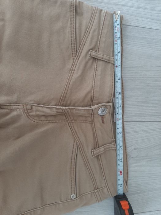 Beżowe spodnie Orsay XS
