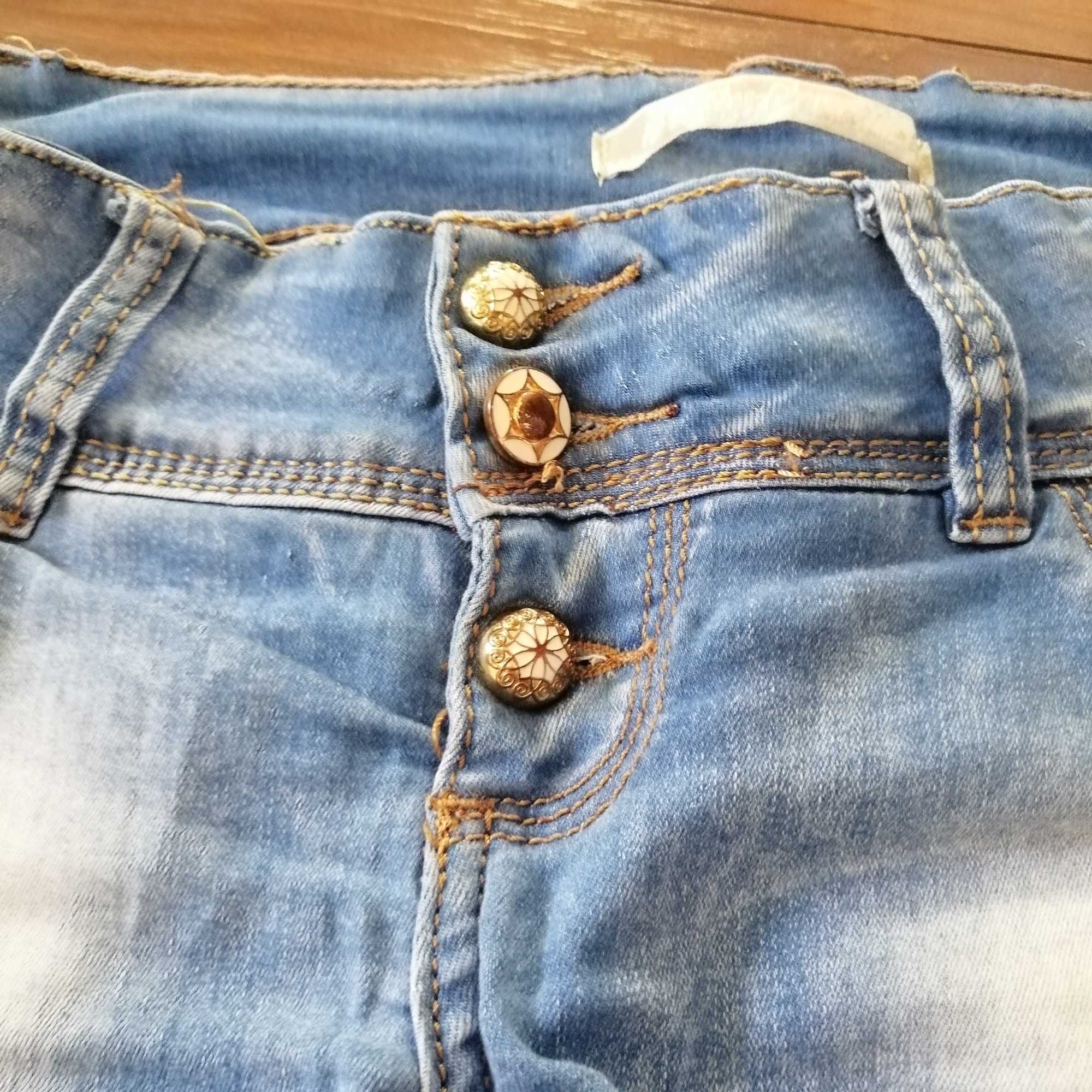 Jeans z dżetami i "dziurami", r. L