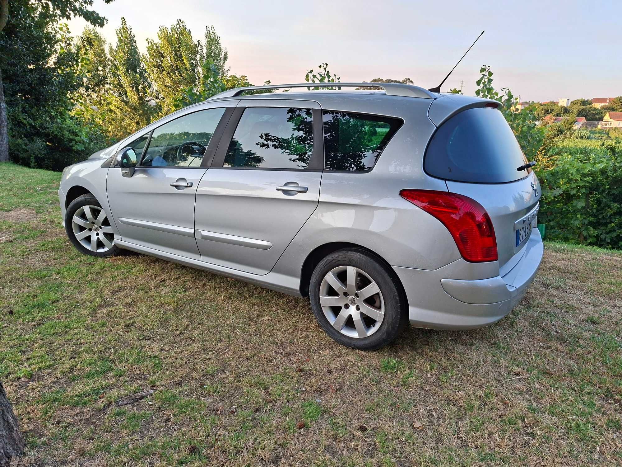 Peugeot 308 sw Hdi 7 lugares com teto