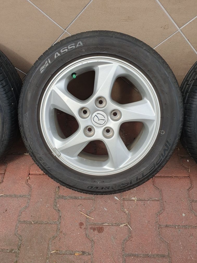 Oryginalne Felgi 15" Mazda 5x114.3 ET50+ 195.55.15 Letnie 7mm