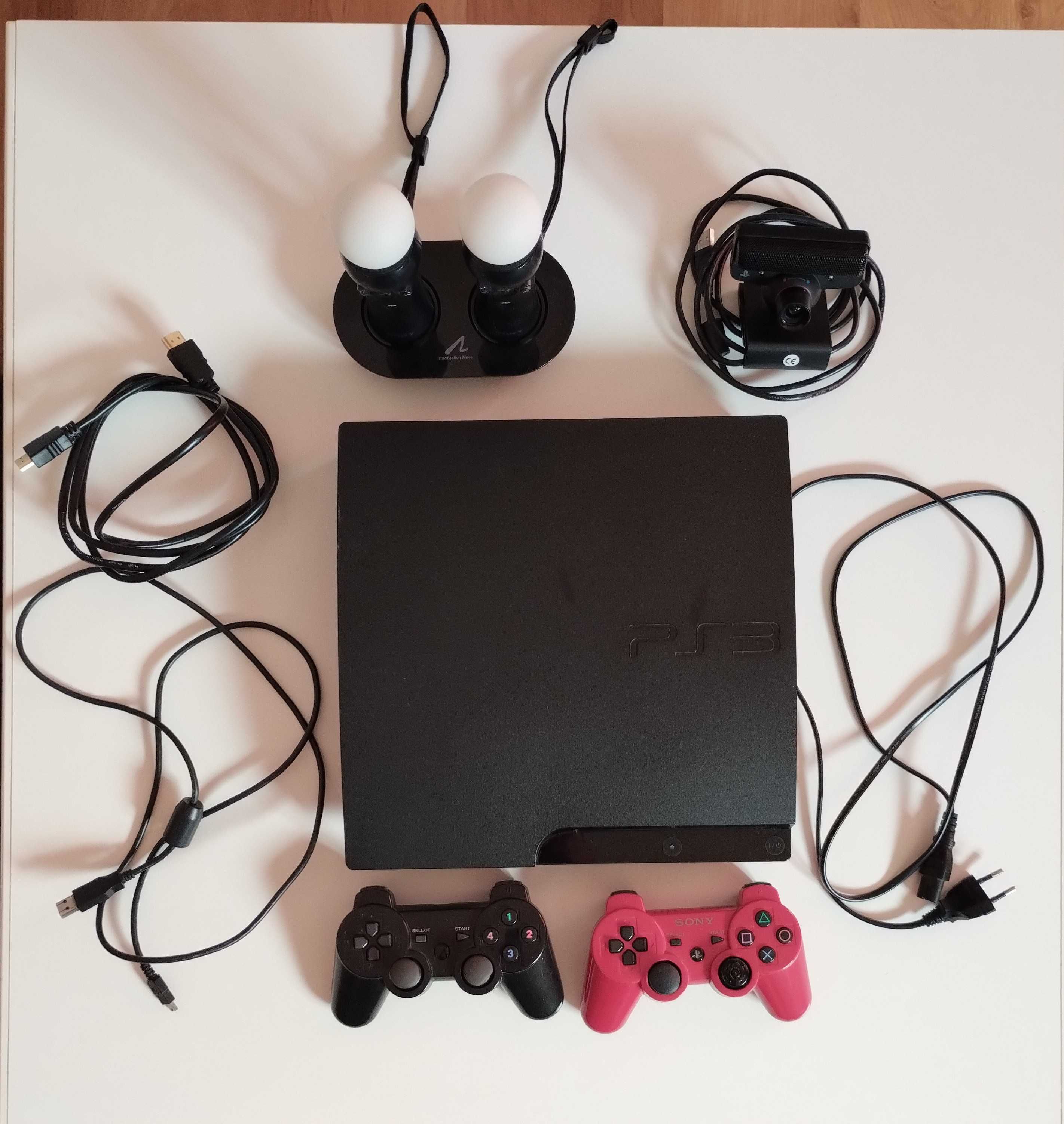 Konsola Sony PS3 + dwa pady + dwa kontrolery Move +  14 płyt z grami