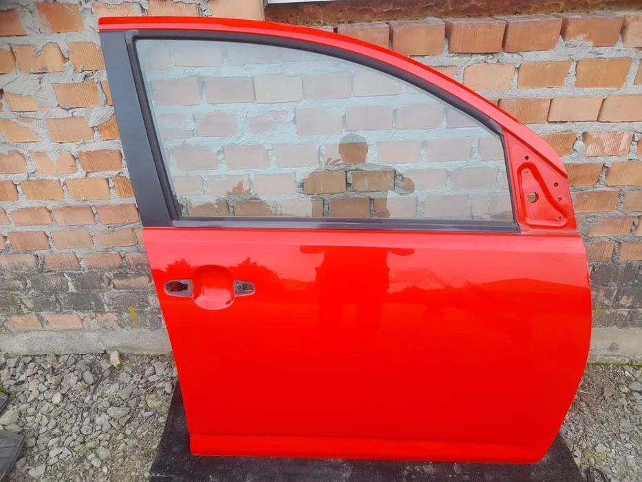 Drzwi prawe przód przednie  Daihatsu Sirion II Justy IV