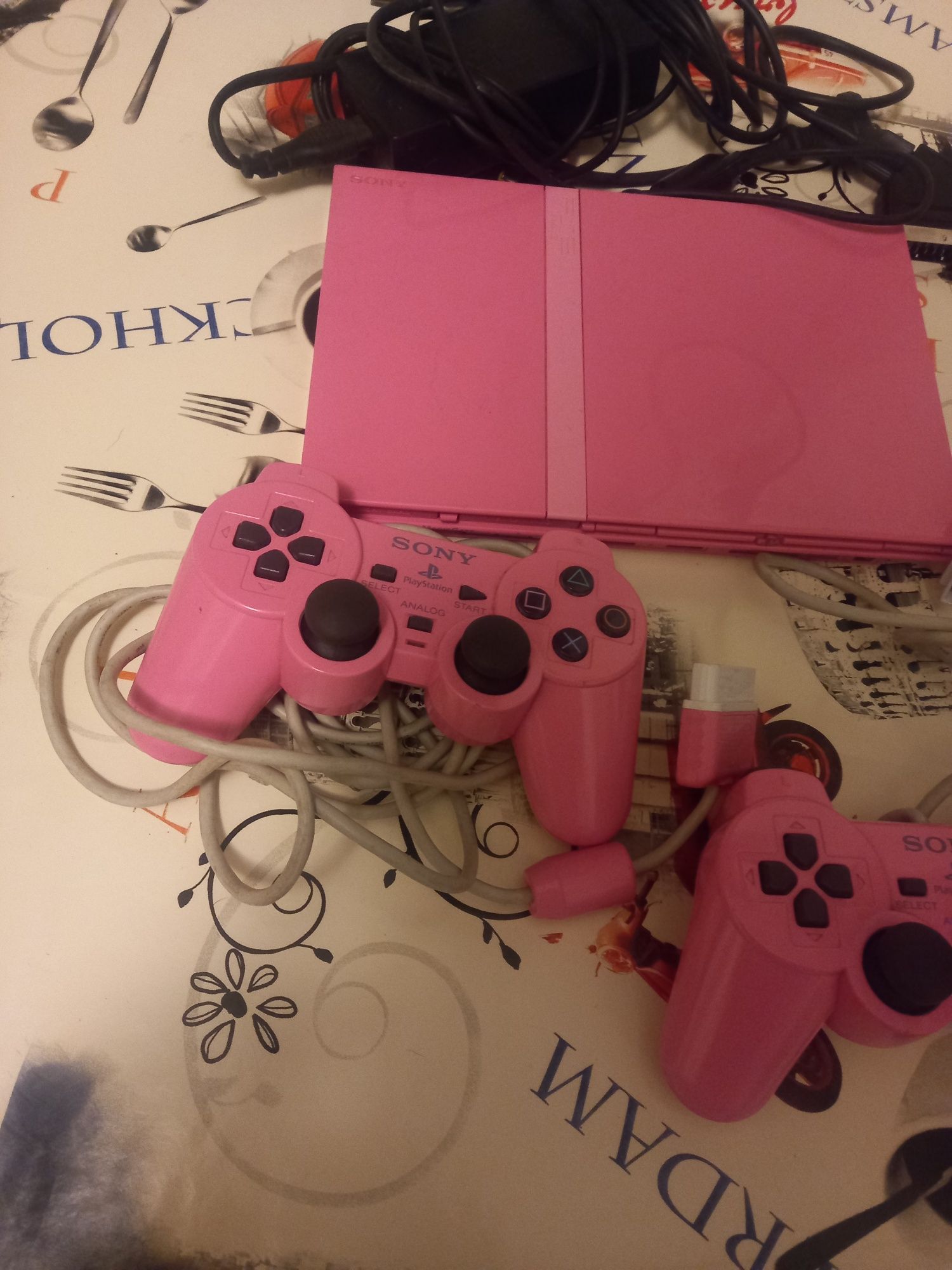 Consola ps2 rosa