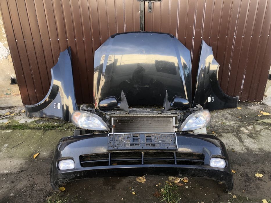 Передній Бампер Chevrolet Lacetti  комплектний перід чорний