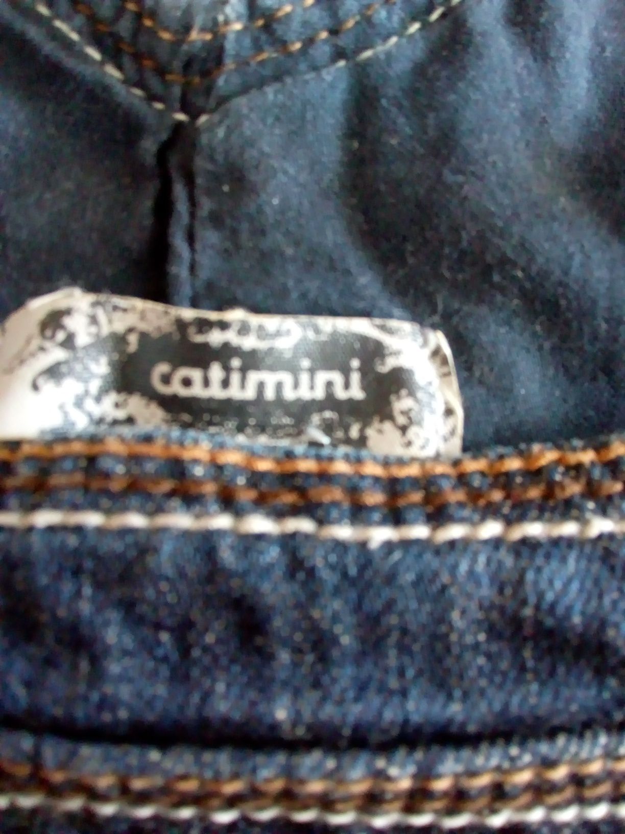 Продам джинсовый комбинезон Саtimini