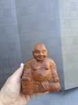 Drewniana rzeźbiona figurka Buddy