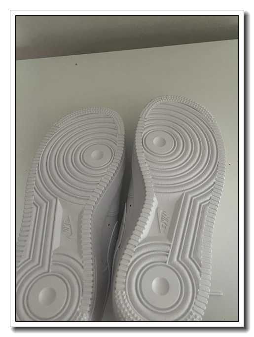 Białe tenisówki Air Force 1 w rozmiarze 38