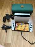 Nintendo Switch OLED + akcesoria (stan idealny), zakupione 12.2024