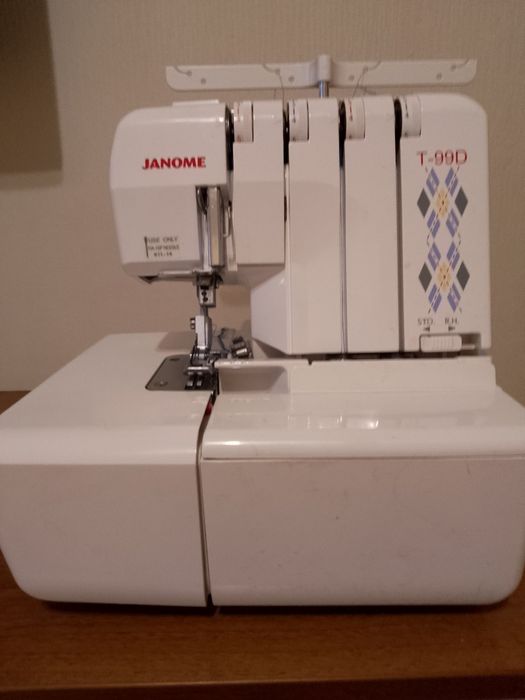 Продам швейную машинку оверлок JANOME  T-99D