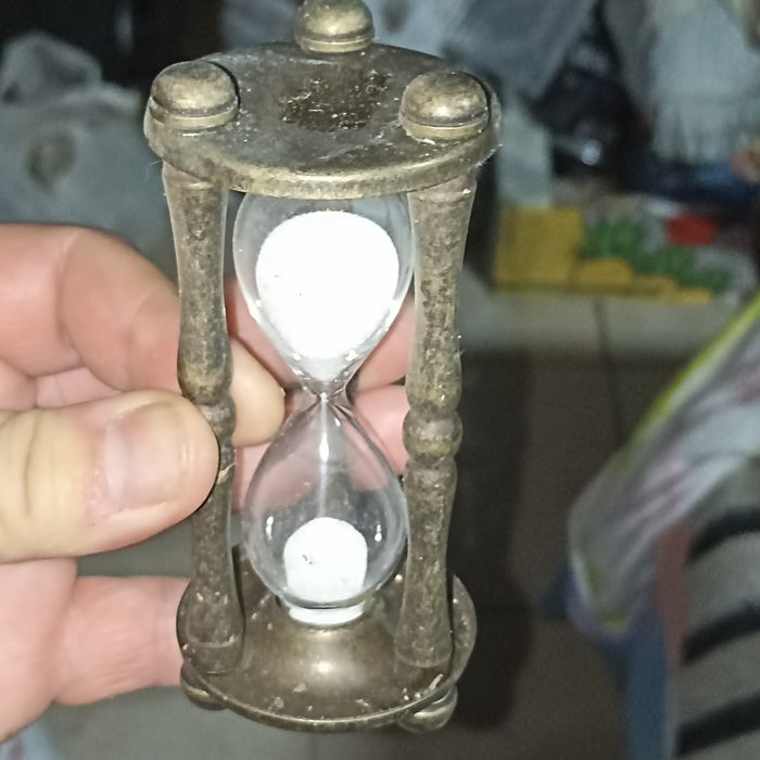 Relógio do Tempo em metal e vidro