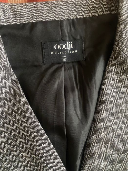 Жіночий костюм піджак + спідниця.