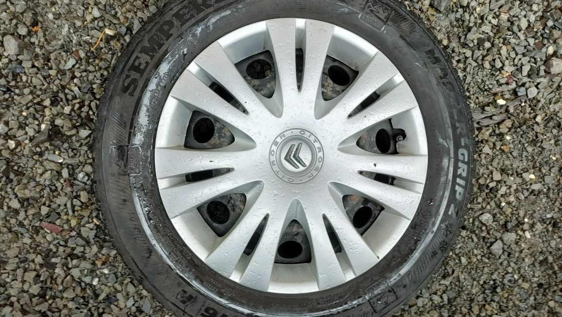 Felgi stalowe z oponami zimowymi, kołpaki,śruby. Citroen C4 Picasso 2