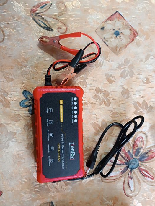 Зарядне під любий акамулятор нове