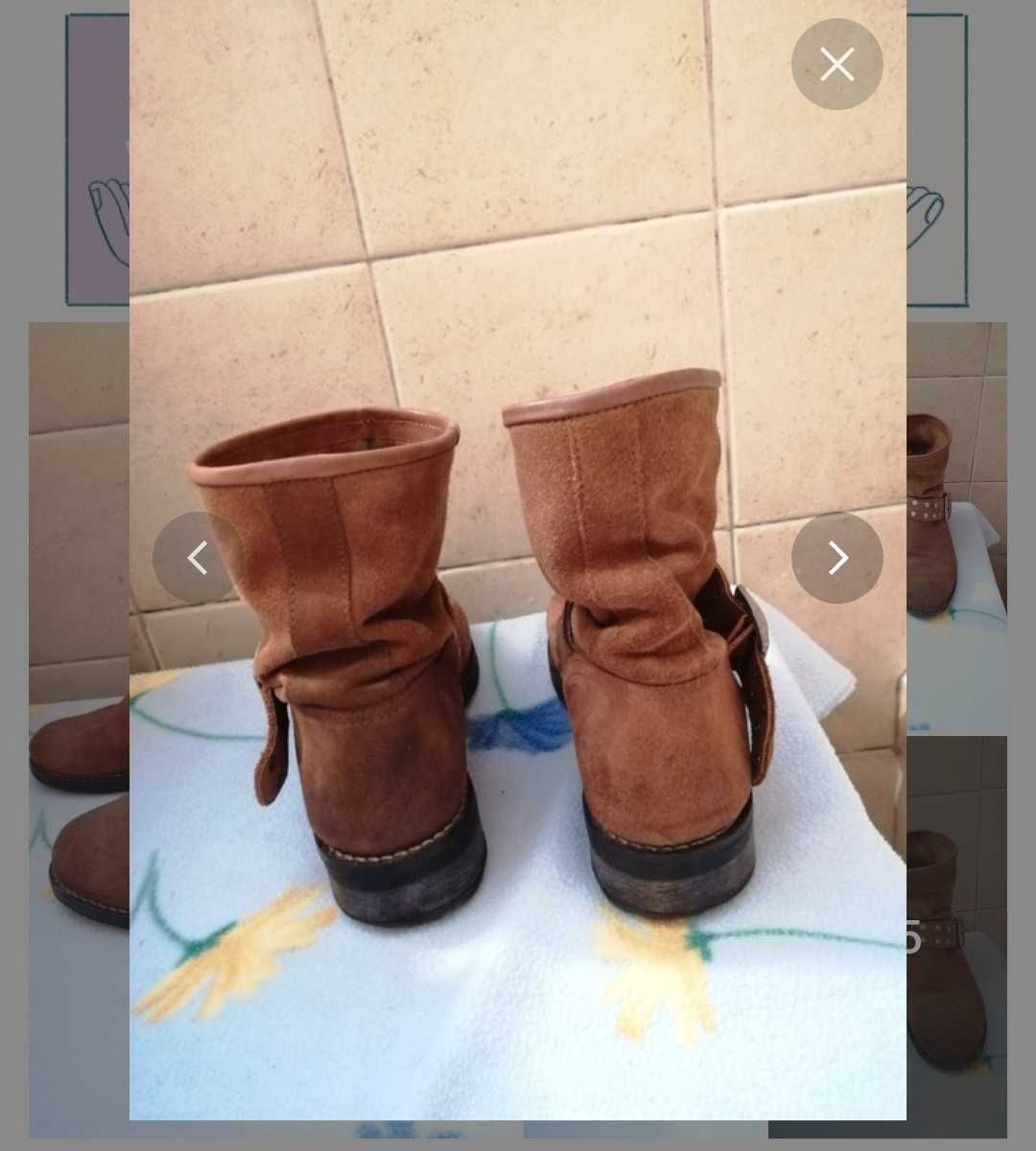 Botas em pele castanha