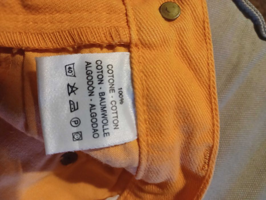 Calças Benetton cor de laranja