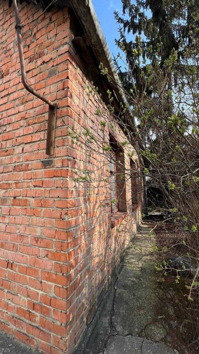 Продаж фасадного будинку з ділянкою