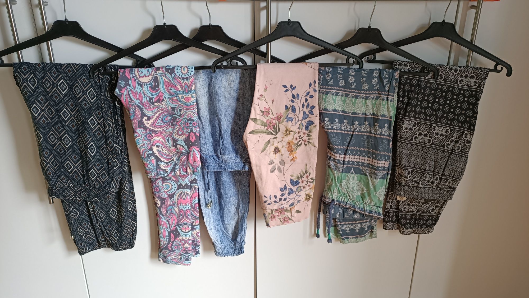 Letnie damskie spodnie na gumkę kwiaty orientalne wzory 36 S