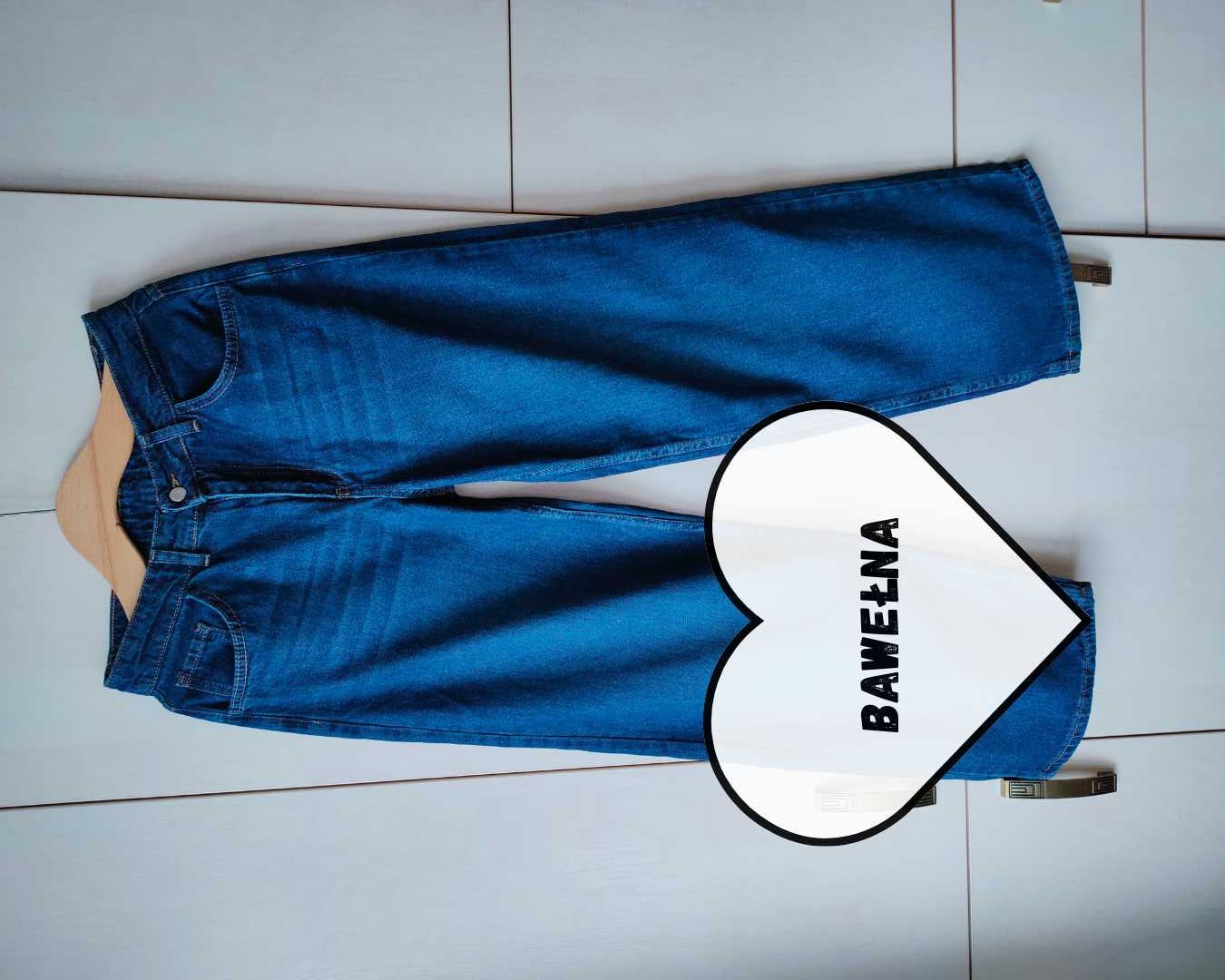 NOWE, niebieskie jeansy z przetarciami r. 40 (L)