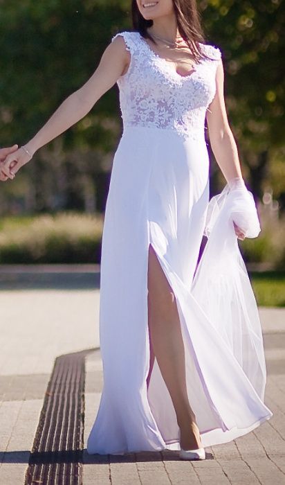 biała suknia ślubna z głębokim rozcięciem na nodze, stan idealny