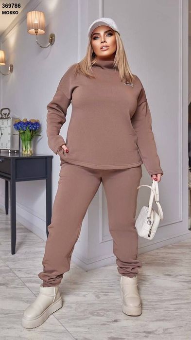 Костюми жіночі ..