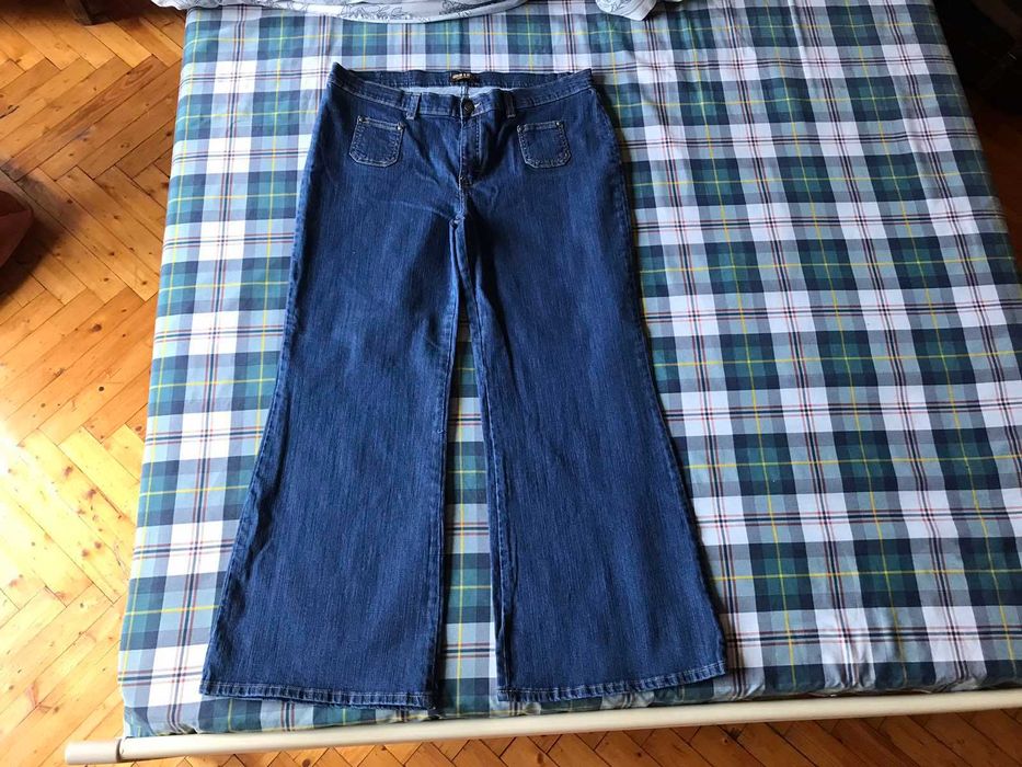 Новые джинсы широкие к низу клеш  Run&Fly размер 54-56.