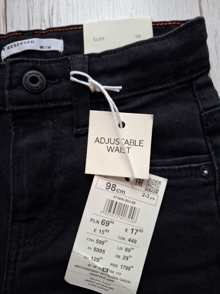 Spodnie jeans z przetarciami roz 98 Reserved z metką