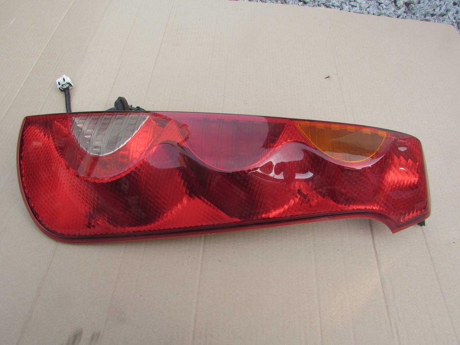 nissan note e11 06-09 lampa tyl lewa prawa europa mgielna w zderzak