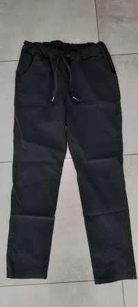 Spodnie gumy czarne r.44