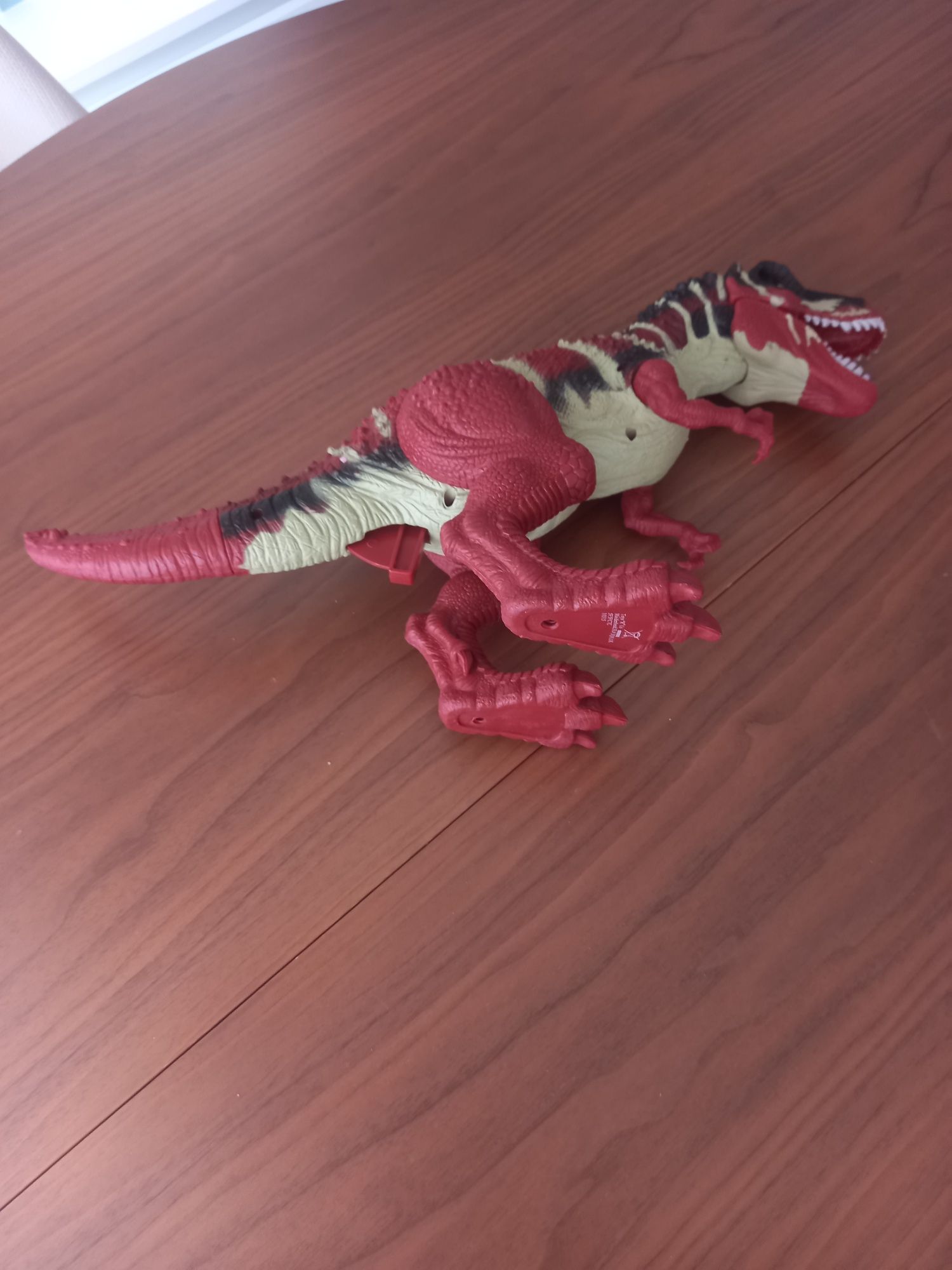 Dinossauro vermelho