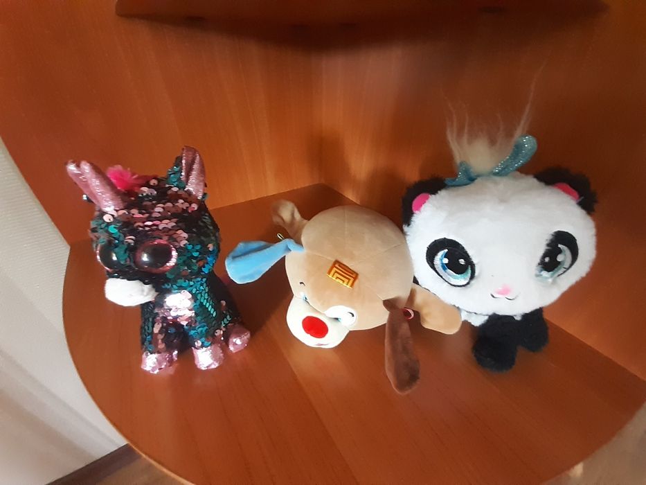 Продам детскую мягкую игрушку.поет песни.