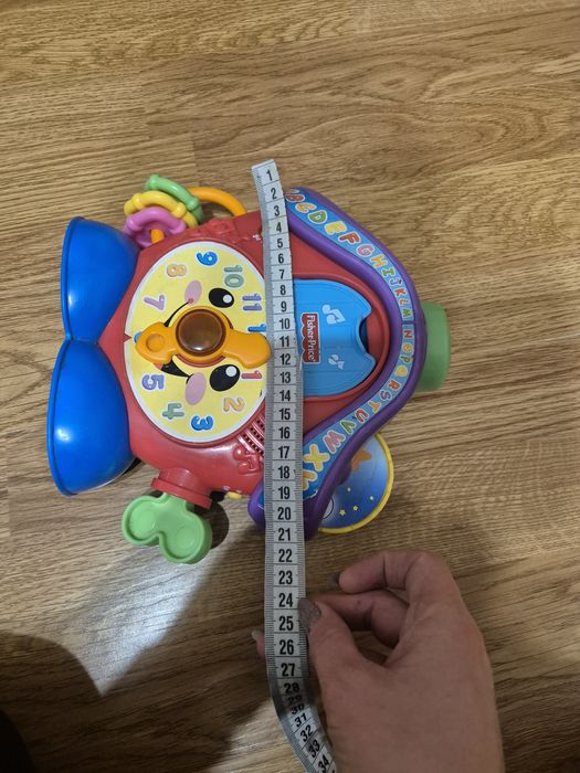 Іграшка годинник розвиваюча