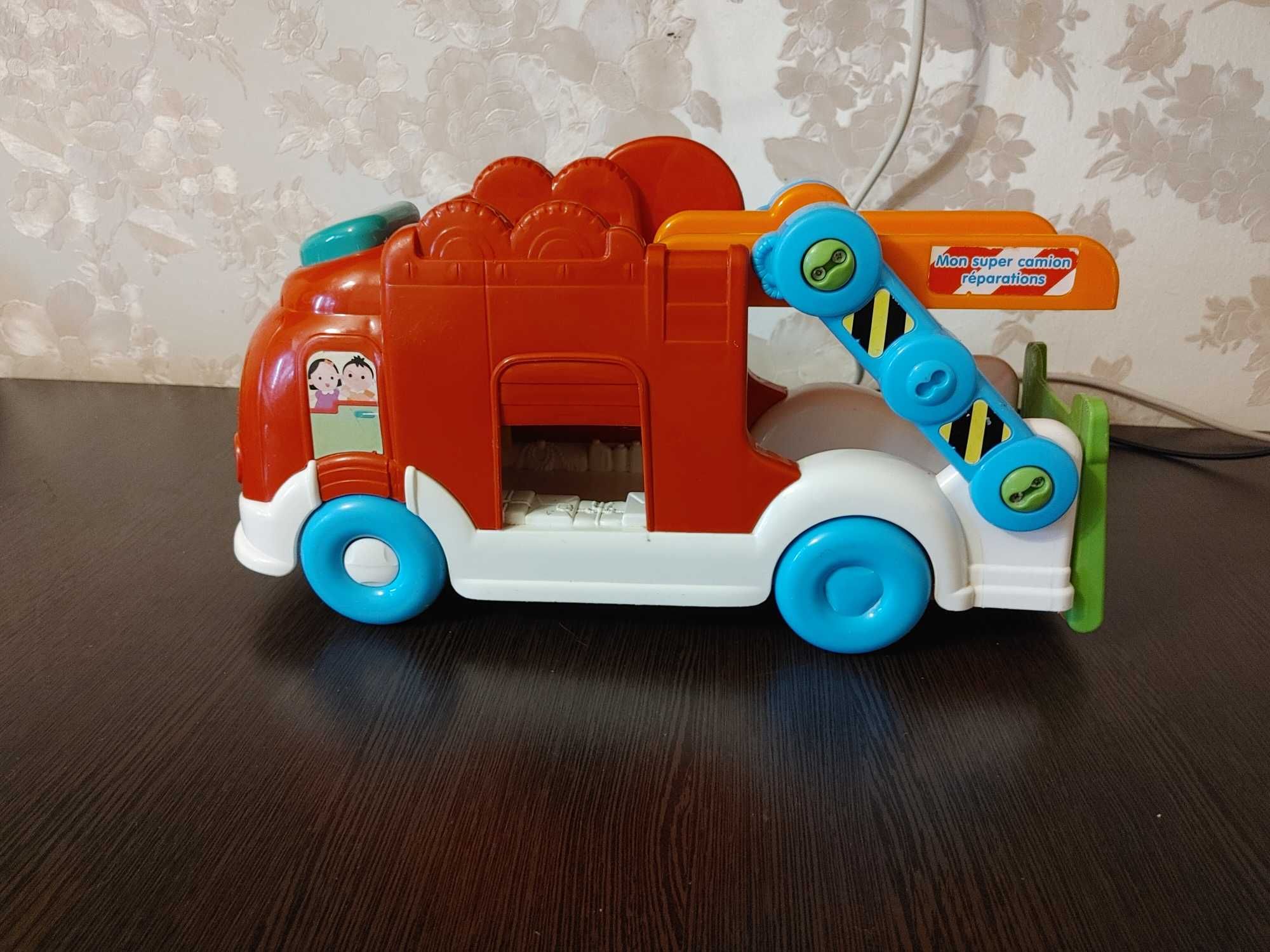 Светомузыкальная детская машинка автовоз.