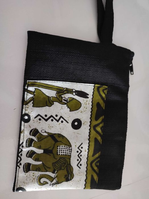 Carteiras, nécessaire e decoração para mesa de tecido Africano