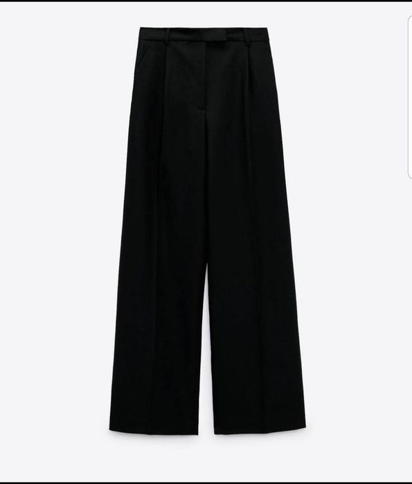 Новые женские черные брюки 34р