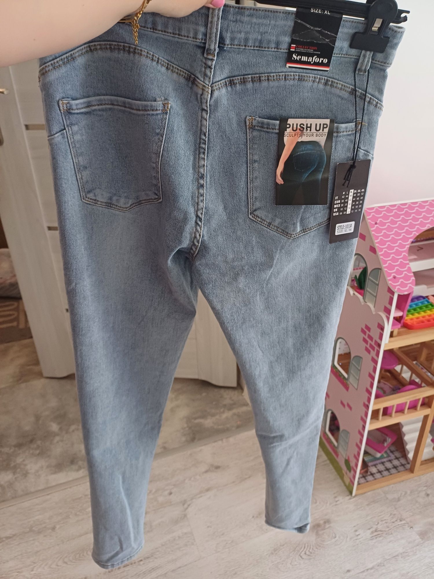 Spodnie jeansowe serduszka roz 42 małe 44