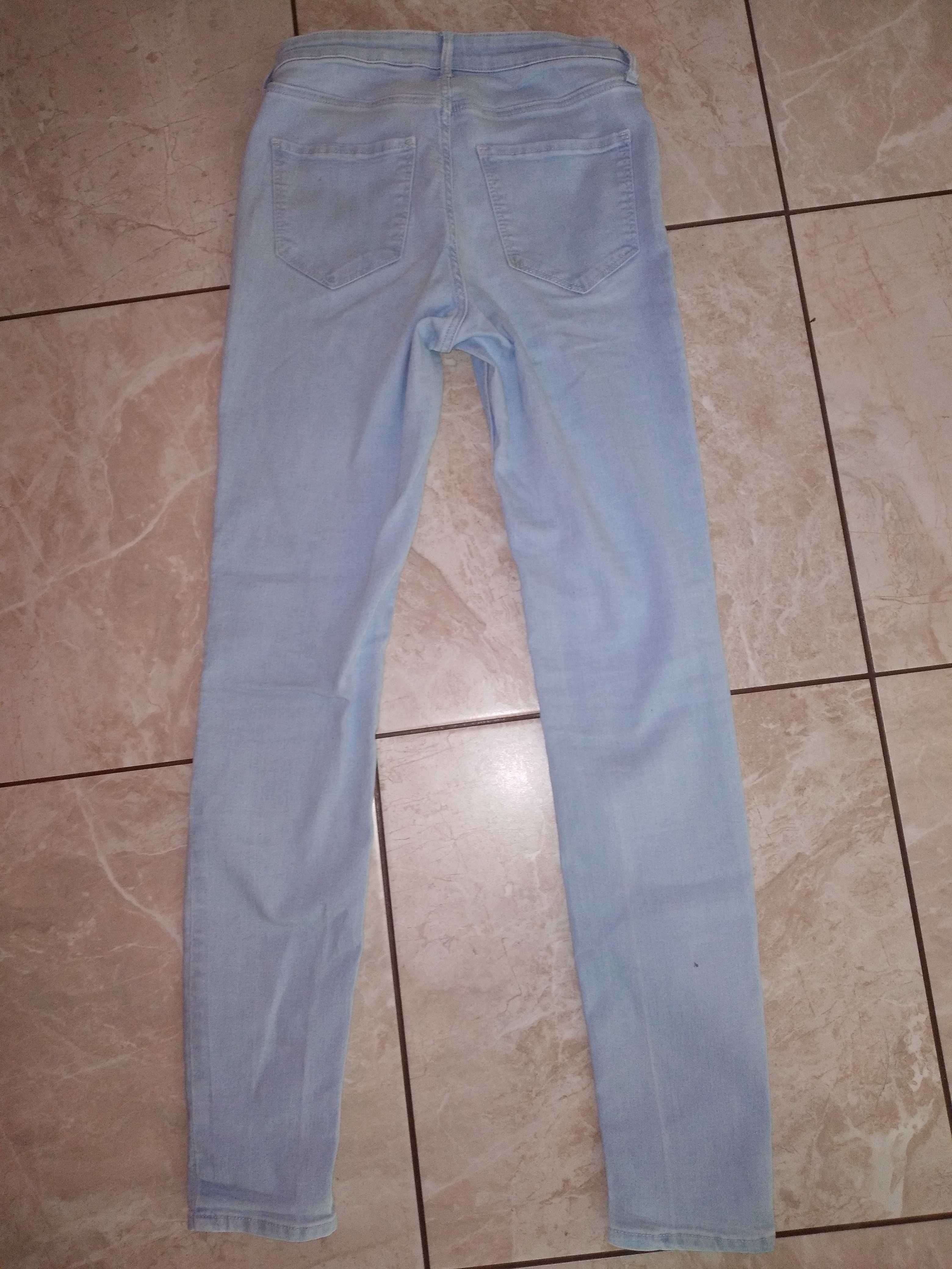 Zestaw ubrań spodnie jeansy z regulacją i 2 bluzy 164