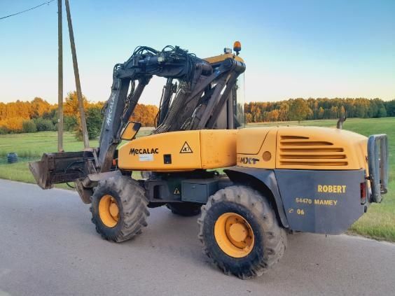 Koparko-Ładowarka MECALAC MXT12