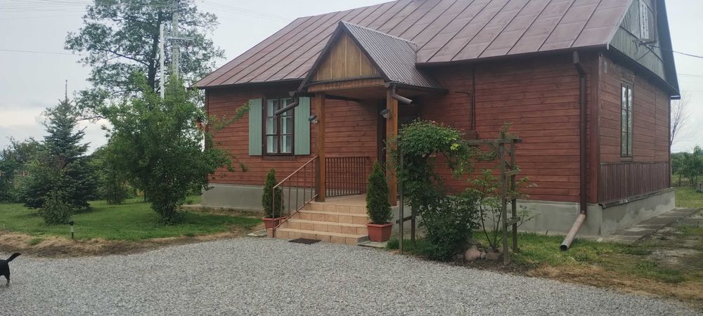 Sprzedam dom drewniany wraz z budynkami gospodarczymi