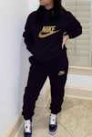 Dresy damskie Nike Puma Guess Tommy Hilfiger Boss itp