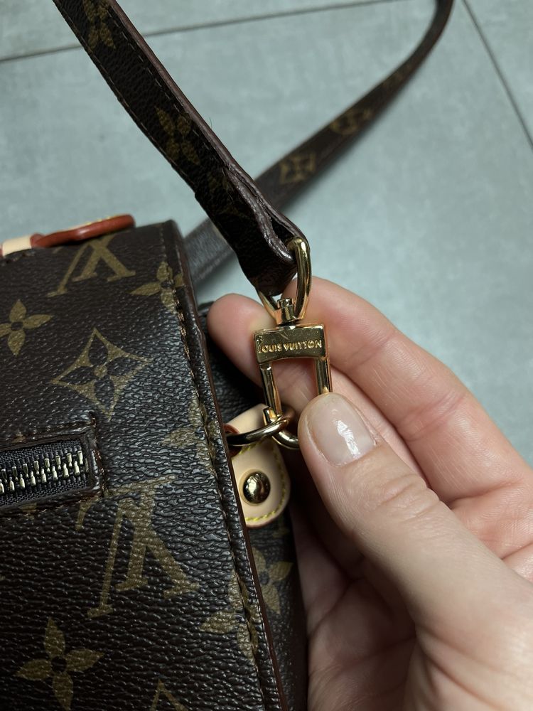 Torepka Louis Vuitton pochette metis