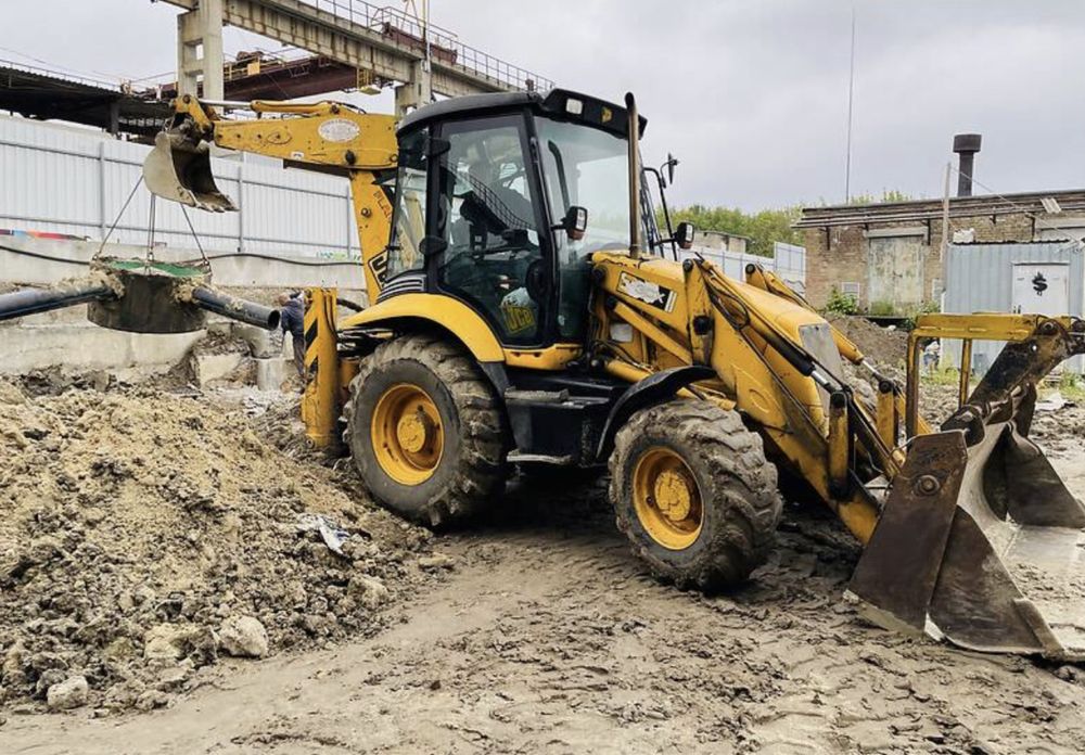 Услуги аренда колесного екскаватора погрузчик трактор  миниэкскаватор