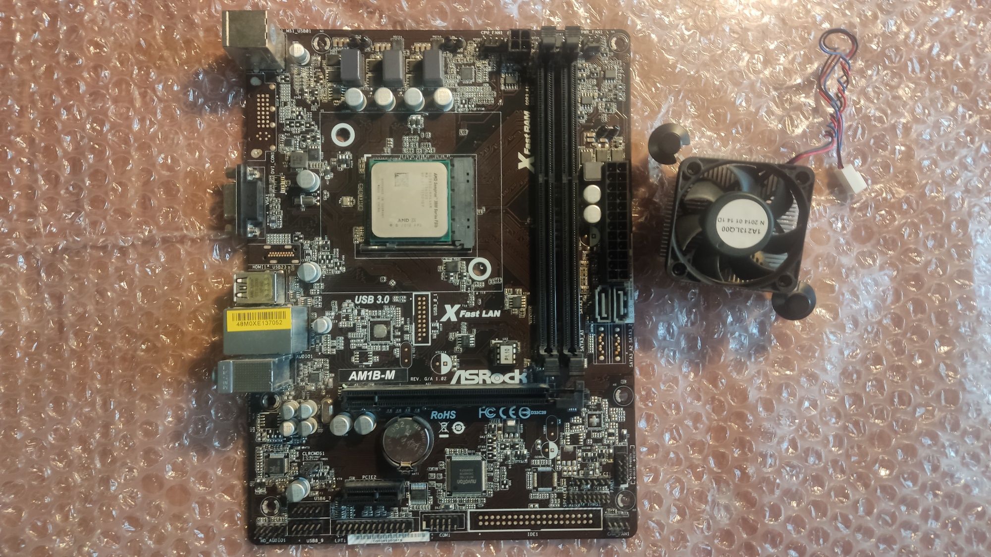 Комплект Asrock AM1B-M та процессор