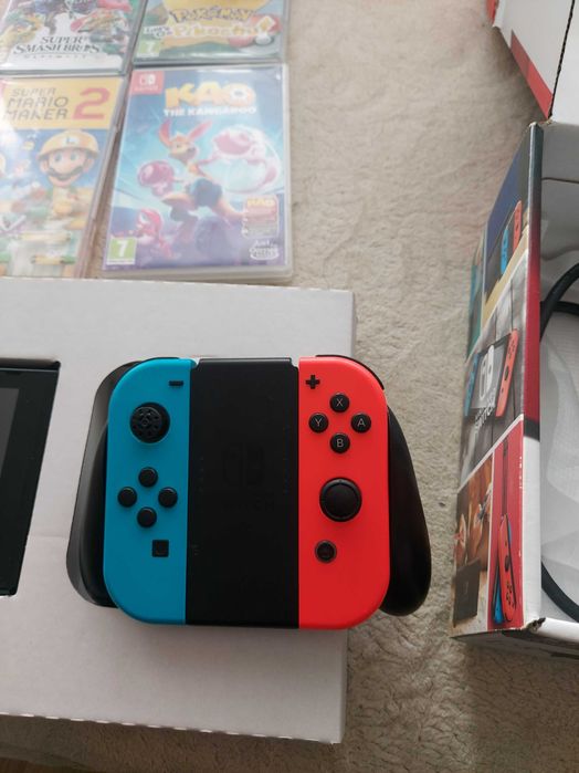 Nitendo switch plus 4 gry