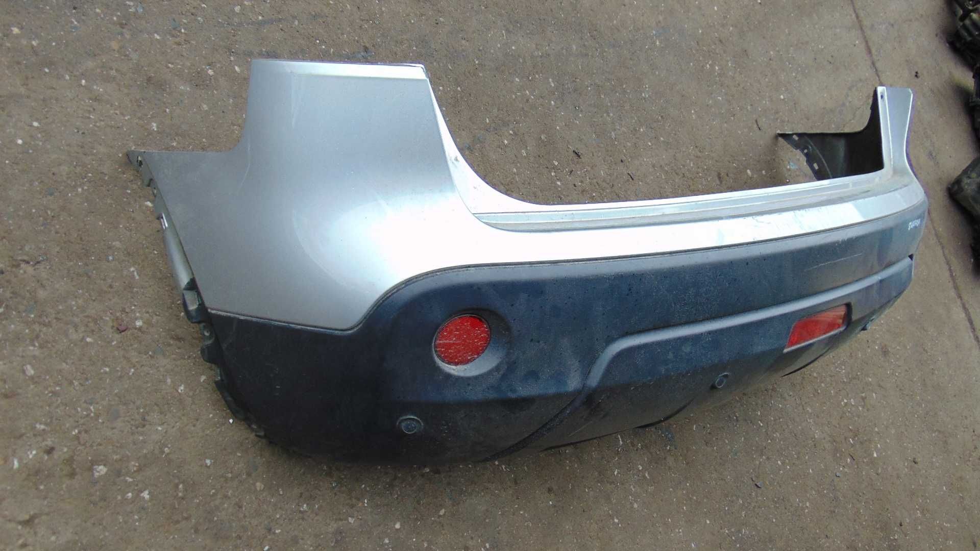 Cze55 Zderzak tylny nissan qashqai j10 srebrny PDC kompletny wysyłka