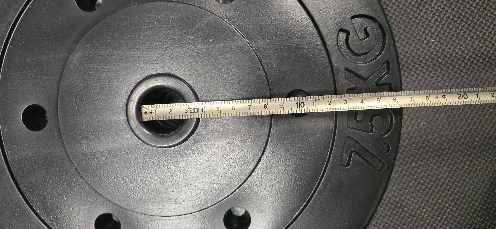 Pesos, discos e barras para musculação