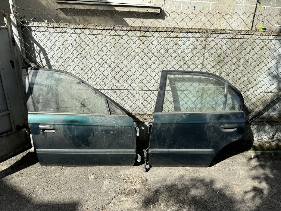 Двері в зборі склопідіймачі honda civic 6